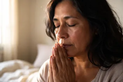 Close-Up Portrait of Woman in Prayer