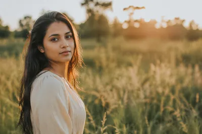 Serene Young Woman in Meadow Portrait