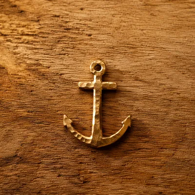 Handmade Gold Anchor Cross on Warm Wood