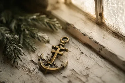 Anchor Cross Charm on Winter Windowsill