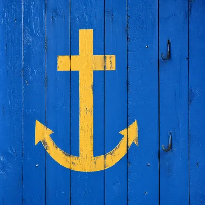 Yellow Anchor Cross on Blue Wooden Planks