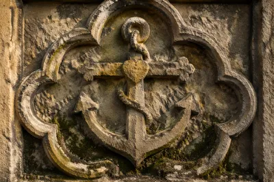 Weathered Anchor Cross Relief with Evergreen Moss