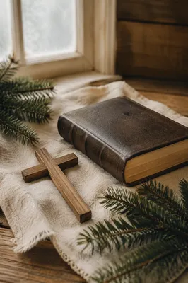 Bible and Wooden Cross on Linen