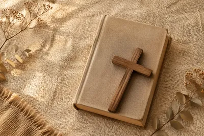 Bible and Wooden Cross on Linen