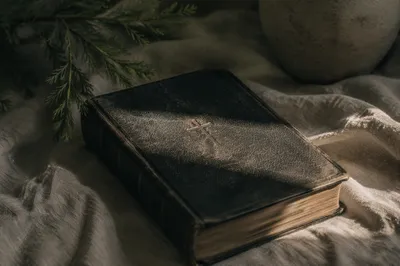 Bible with Cross on Linen Cloth