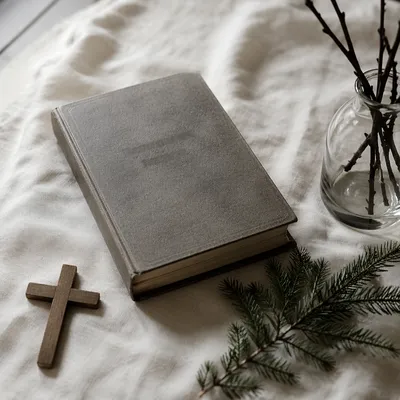 Bible and Wooden Cross on Linen