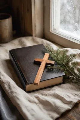 Bible and Wooden Cross on Linen