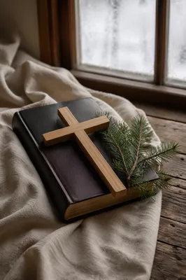 Bible and Wooden Cross on Linen