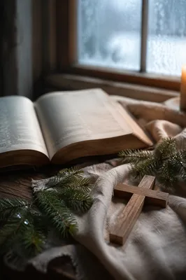 Open Bible and Cross on Linen