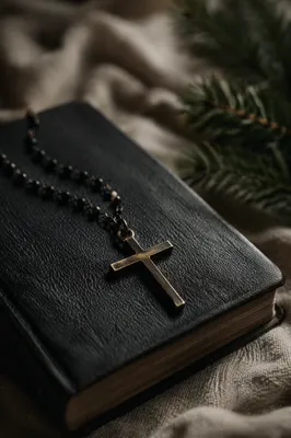 Bible and Cross on Linen with Evergreen