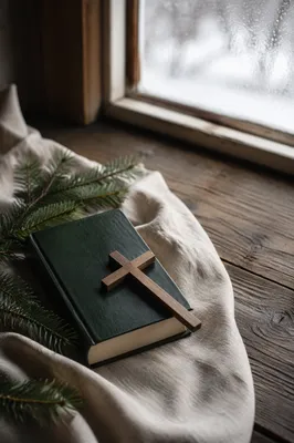 Bible and Wooden Cross on Winter Linen