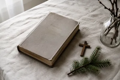 Bible and Wooden Cross on Linen