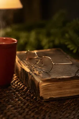 Bible with Reading Glasses in Warm Light
