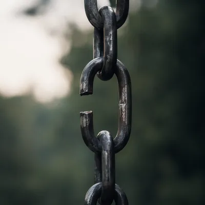 Broken Iron Chain Symbolizing Freedom