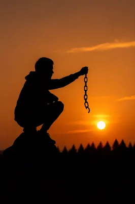 Broken Chains at Sunset Freedom Silhouette