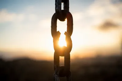 Broken Chains in Golden Sunrise