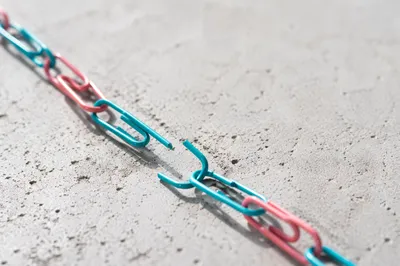 Broken Paper Clip Chain Freedom Concept