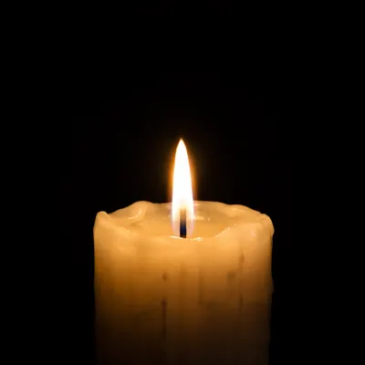 Burning Candle of Quiet Faith in Darkness