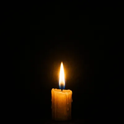 Burning Candle in Darkness for Faith