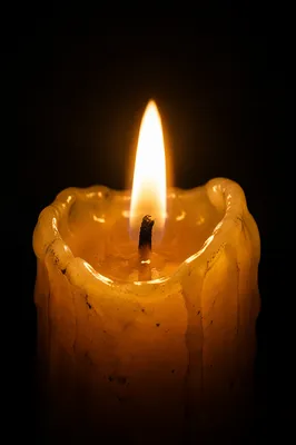 Burning Candle in Darkness for Faith