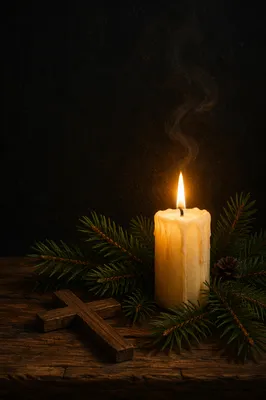 Burning Candle with Evergreen Faith Cross
