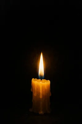 Burning Candle in Darkness for Faith