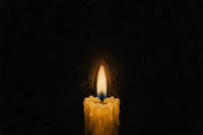 Burning Beeswax Candle in Sacred Darkness