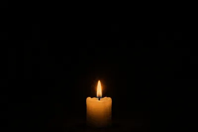 Burning Candle of Quiet Faith