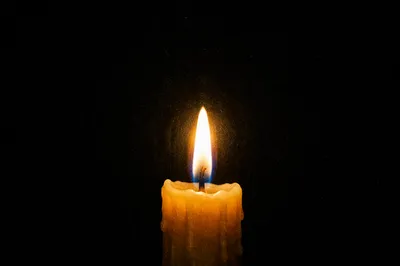 Burning Candle in Darkness for Faith
