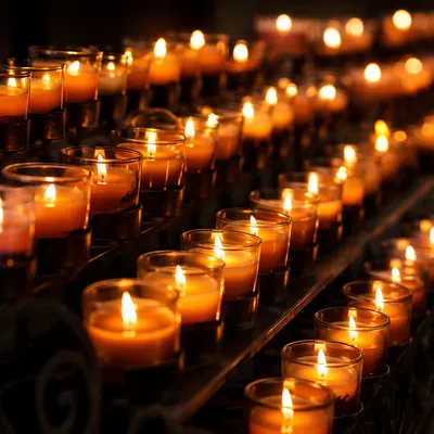 Burning Votive Candles in Quiet Faith
