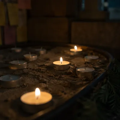Burning Tea Lights with Evergreen Faith