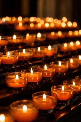 Burning Votive Candles in Quiet Faith