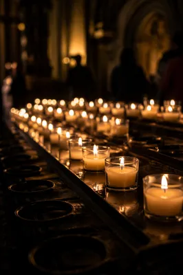 Glowing Votive Candles in Quiet Sanctuary