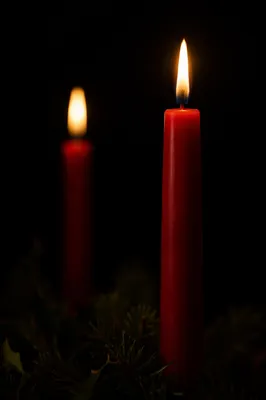 Burning Red Candles in Quiet Faith