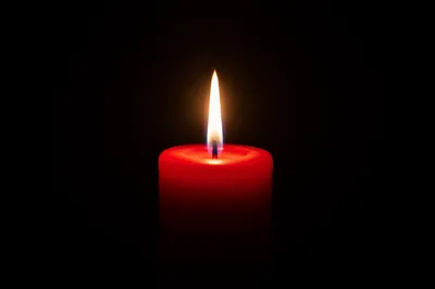 Burning Red Candle of Quiet Faith
