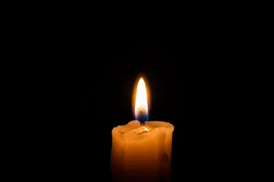 Burning Beeswax Candle of Quiet Faith