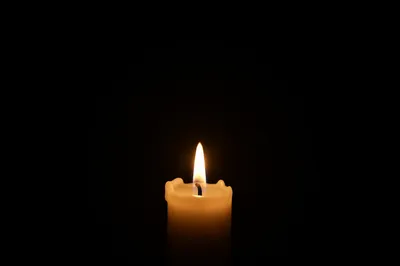 Burning Candle of Quiet Faith