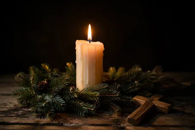 Candlelit Faith with Evergreen Cross