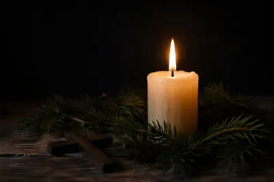 Burning Candle of Faith in Darkness