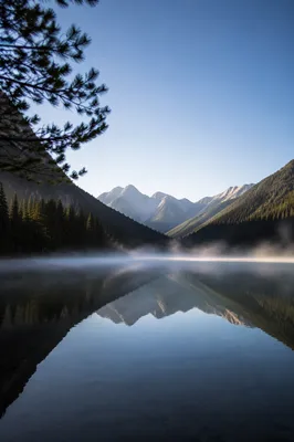 Calm Alpine Lake Morning Reflection