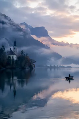 Misty Alpine Lake Chapel at Dawn