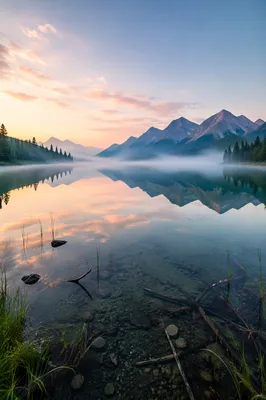 Calm Alpine Lake Reflection at Sunrise