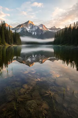 Calm Alpine Lake Reflection at Sunrise