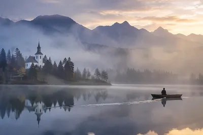 Calm Alpine Lake Chapel at Dawn
