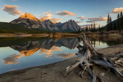 Calm Alpine Lake Reflection at Sunrise
