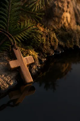Wooden Cross Reflected in Still Water
