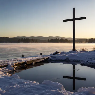 Wooden Cross Reflected on Frozen Lake