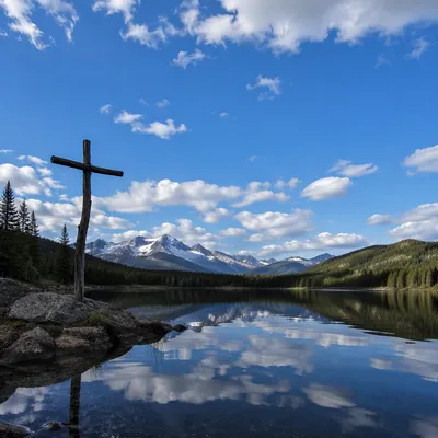 Wooden Cross Reflected on Evergreen Lake