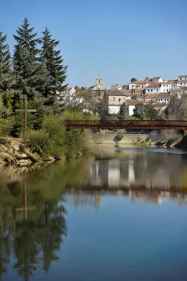 Wooden Cross Reflected by Calm River