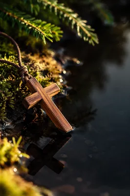 Wooden Cross Reflected in Still Water